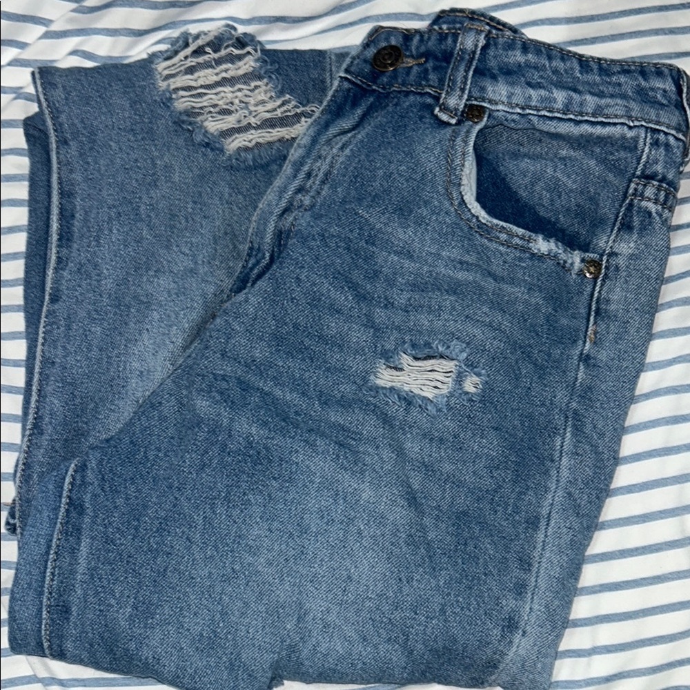 Distressed Blue Jeans